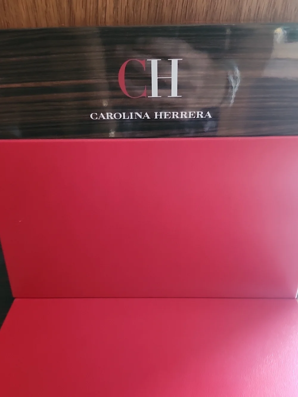 Carolina Herrera Red and Wood Two-Tier Display
